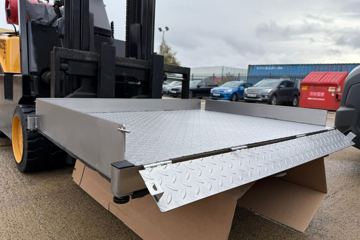 Drop-front design — the front face hinges open for engineer access without dismantling the install.